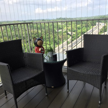 Balcony with timber deck and invisble grille for security.