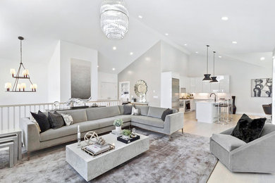 Living room - large contemporary open concept light wood floor and beige floor living room idea in New York with gray walls, a standard fireplace and a wall-mounted tv