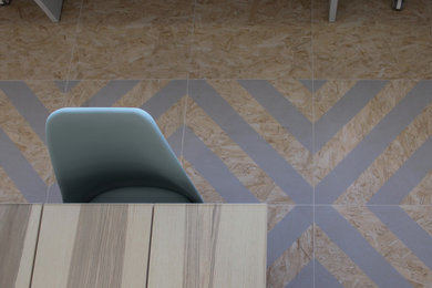 Imagen de despacho minimalista pequeño con paredes blancas, suelo de baldosas de cerámica, escritorio independiente y suelo multicolor