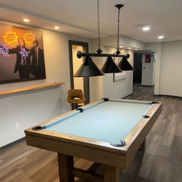 Basement Remodel with bar and game room