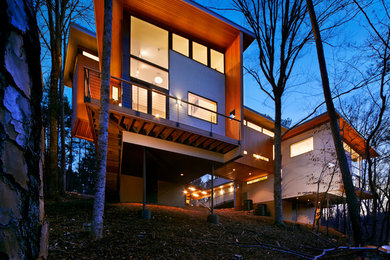 Inspiration for a contemporary exterior in Raleigh with wood siding.