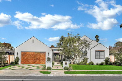 Photo of a front door in Orange County with white walls, a single front door and a black front door.