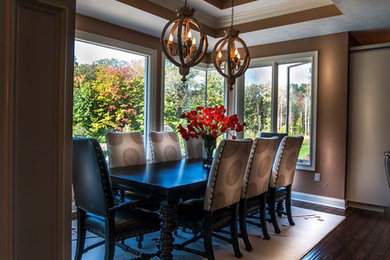 Kitchen/dining room combo - large eclectic dark wood floor kitchen/dining room combo idea in Cleveland with beige walls