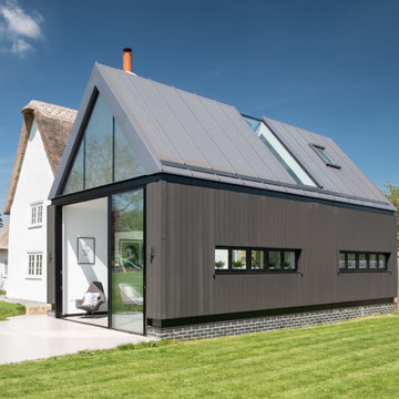 Listed Building repairs and contemporary extension  Great Eversden