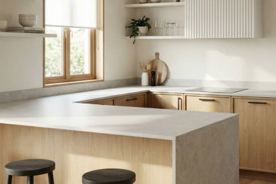 Design ideas for a medium sized scandinavian grey and brown u-shaped kitchen/diner in Other with an integrated sink, recessed-panel cabinets, medium wood cabinets, engineered stone countertops, grey splashback, engineered quartz splashback, black appliances, medium hardwood flooring, an island, brown floors and grey worktops.