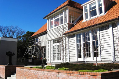 Design ideas for a large traditional home design in Brisbane.