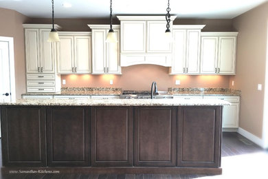 Large elegant l-shaped dark wood floor eat-in kitchen photo in Other with an undermount sink, raised-panel cabinets, white cabinets, granite countertops, stainless steel appliances and an island