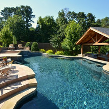Infinite pool with a center bar