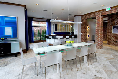 Example of a mid-sized trendy travertine floor and multicolored floor great room design in Atlanta with gray walls