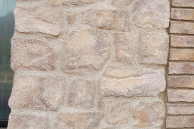 Mountain style stone house exterior photo in Phoenix