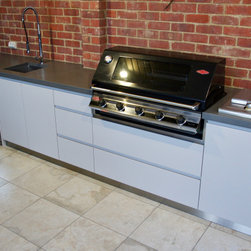Outdoor Kitchen and Bar | polished concrete top island with timber front - BBQs