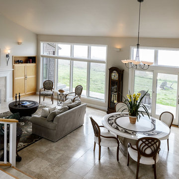 The open concept living area provides an intimate living room and dining room.