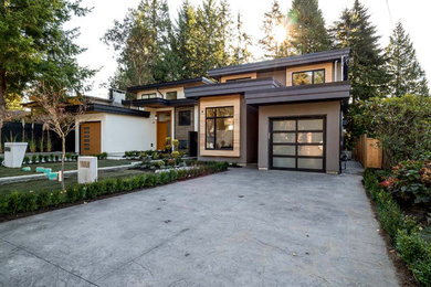 Example of a minimalist exterior home design in Vancouver