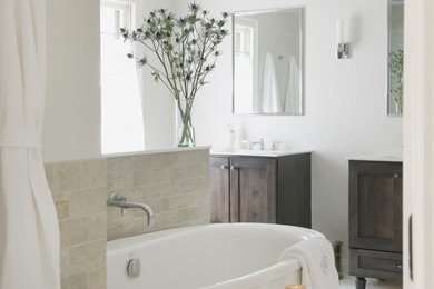 Bathroom - large transitional master beige tile and ceramic tile mosaic tile floor bathroom idea in New York with an integrated sink, dark wood cabinets, a one-piece toilet, gray walls, recessed-panel cabinets and solid surface countertops