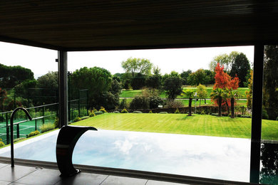 Design ideas for a modern pool in Madrid.