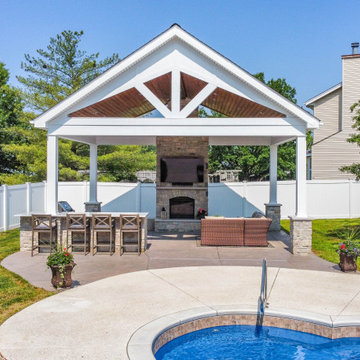 Open Gable Pool House with Fireplace and Grilling Area