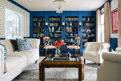 Inspiration for a mid-sized timeless dark wood floor living room library remodel in Chicago