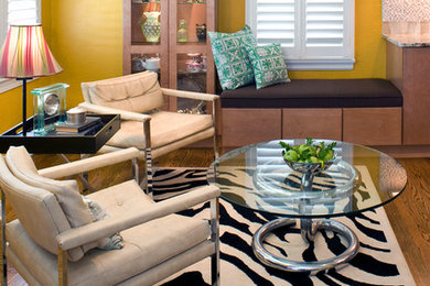 Eat-in kitchen - mid-sized contemporary l-shaped medium tone wood floor eat-in kitchen idea in St Louis with an undermount sink, flat-panel cabinets, light wood cabinets, granite countertops, beige backsplash, stone tile backsplash, stainless steel appliances and an island