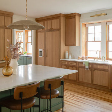 Warm Modern Kitchen Renovation with Natural Oak & Green Accents