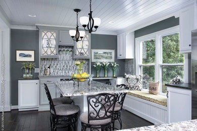 Inspiration for a mid-sized transitional dark wood floor and brown floor kitchen/dining room combo remodel in Other with gray walls and no fireplace