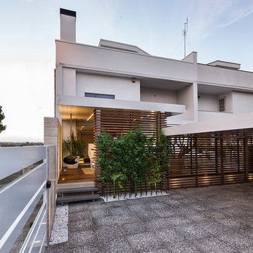 Arch. Antonella Laruccia - Ristrutturazione case a Schiera AB