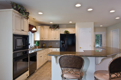 Example of a classic kitchen design in Other
