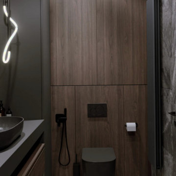 Dark green and wood toilet