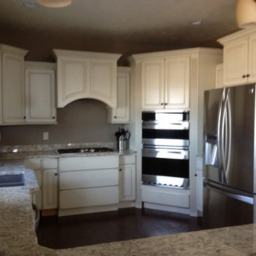 Notice the corner micro/oven cabinet.  The valance wood hood really make a state