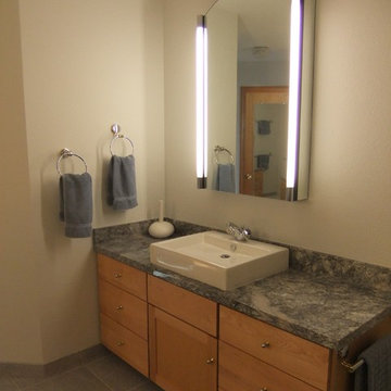 Top mount sink on maple vanity and "Blue Azul" granite.