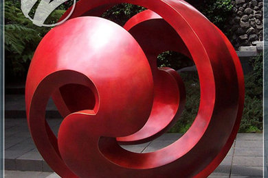 large red sphere steel sculpture