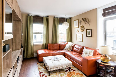 Inspiration for a large timeless enclosed carpeted living room remodel in New York with beige walls, no fireplace and a media wall