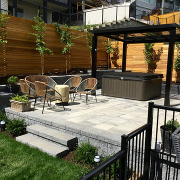 AFTER - Patio with seated area adjacent the hot tub