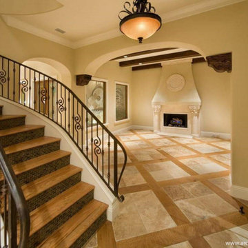 Hand carved stone mantel with overhead mantel
