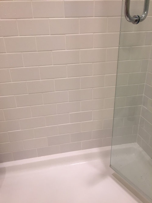 Shower Tiles Becoming Discolored, Water Under Tile Floor In Bathroom