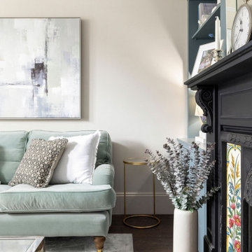 Calm & serene living room with a mix of chrome & brass metal accents