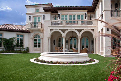 Inspiration for a mediterranean exterior home remodel in Miami