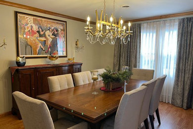 Inspiration for a mid-sized transitional light wood floor kitchen/dining room combo remodel in New York with gray walls and no fireplace