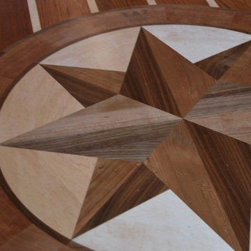 5" Brazilian Cherry planks w/3/4" maple between, with custom inlay also made of