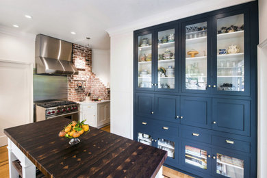 Example of a transitional kitchen design in New York