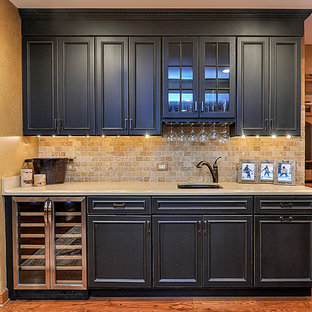 Inspiration for a large rustic fully buried basement in Chicago with beige walls, medium hardwood flooring and orange floors.