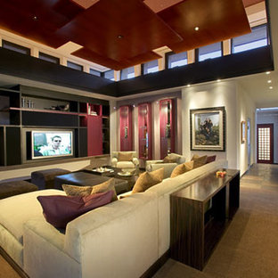Inspiration for a large modern open plan home cinema in Phoenix with grey walls, slate flooring, a wall mounted tv and brown floors.