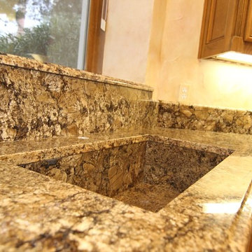 Coliseum kitchen with custom granite sink and Ogee edge