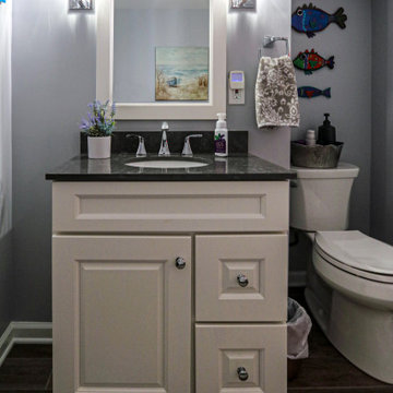 Guest Bathroom White Vanity with Carrara Quartz Countertop and Clawfoot Tub
