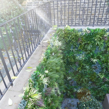 Unsightly Staircase gets Upgraded with Fake Green Walls