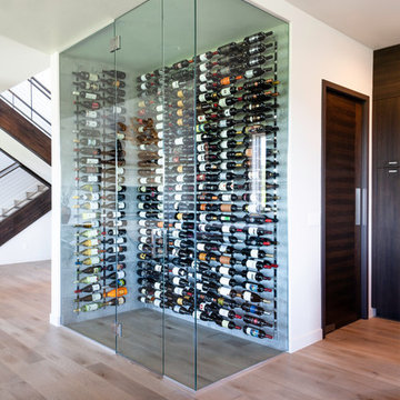 Contemporary elegant glassed-in wine cellar