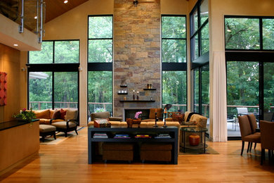 Inspiration for a large contemporary formal and open concept light wood floor living room remodel in Chicago with beige walls
