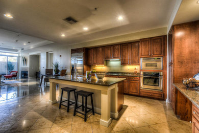 This is an example of a transitional kitchen in Phoenix.