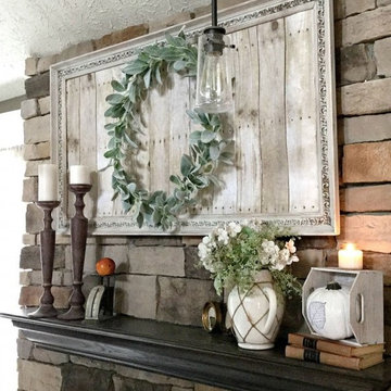 Farmhouse style mantel with repurposed art