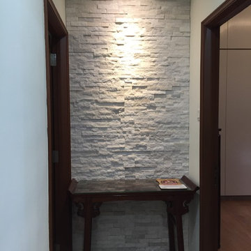 Stone feature wall along walkway