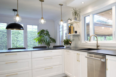 Photo of a transitional kitchen in Montreal.
